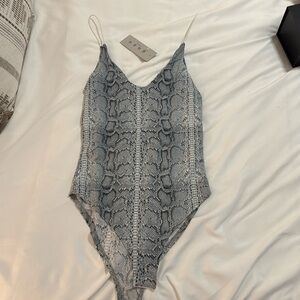 Snake print body suit